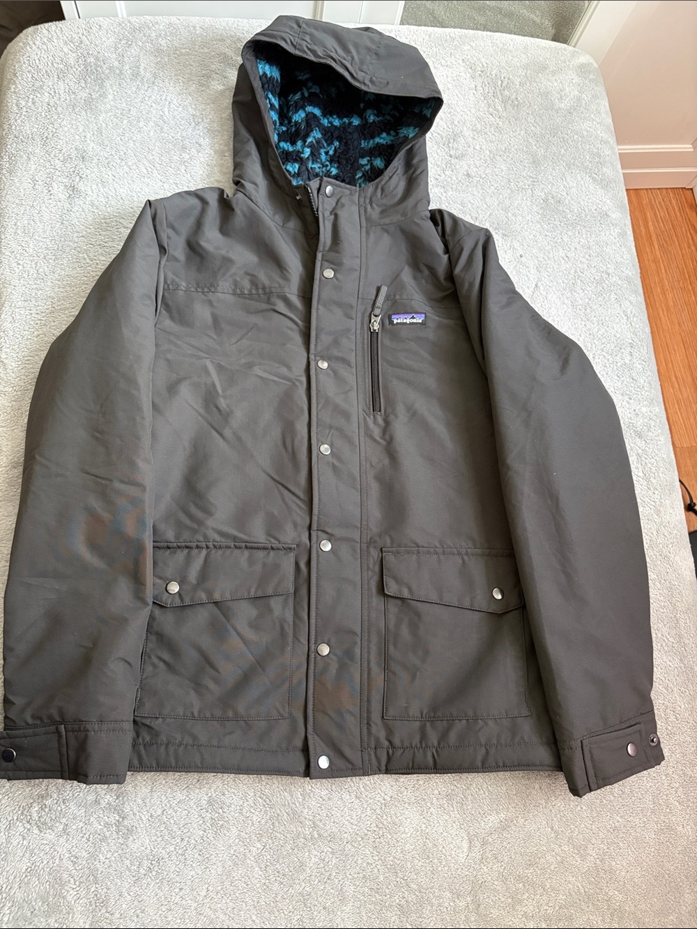 Patagonia Boys Infurno Hooded jacket in Charcoal Gray with Blue Lined Hood